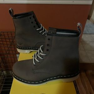 Ladies Dr. Martens steel toed boots.